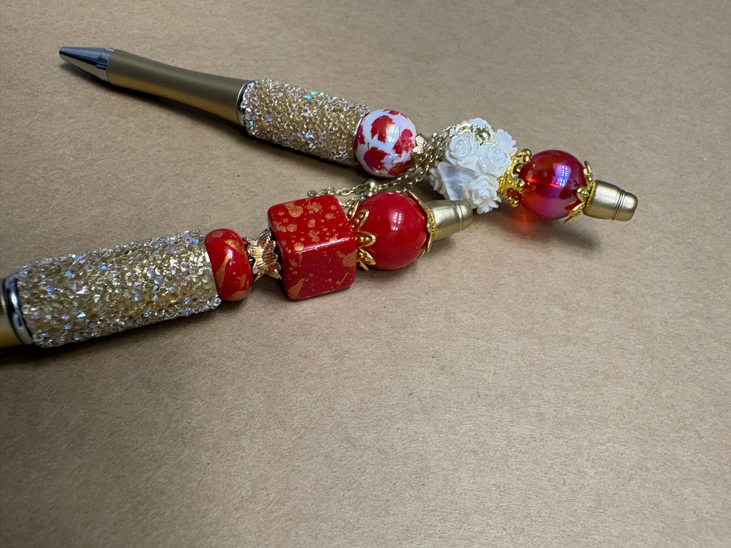 Gold and Red Flame Pens