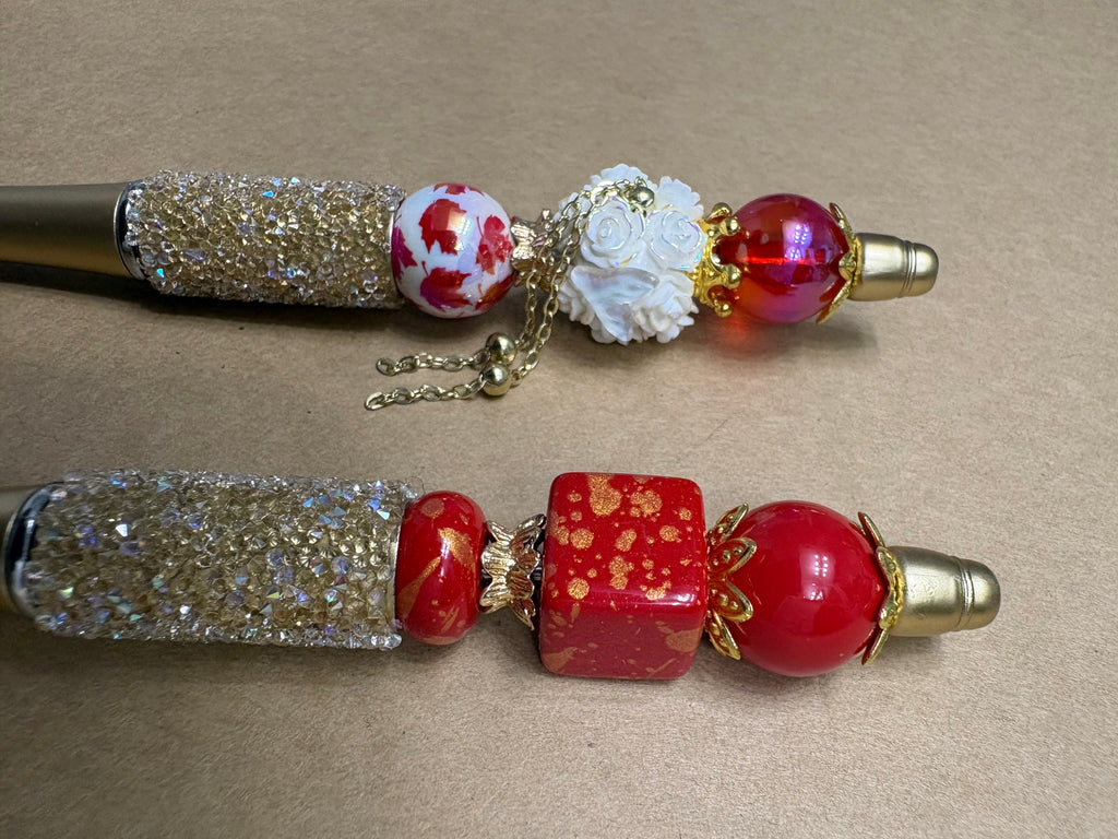 Gold and Red Flame Pens