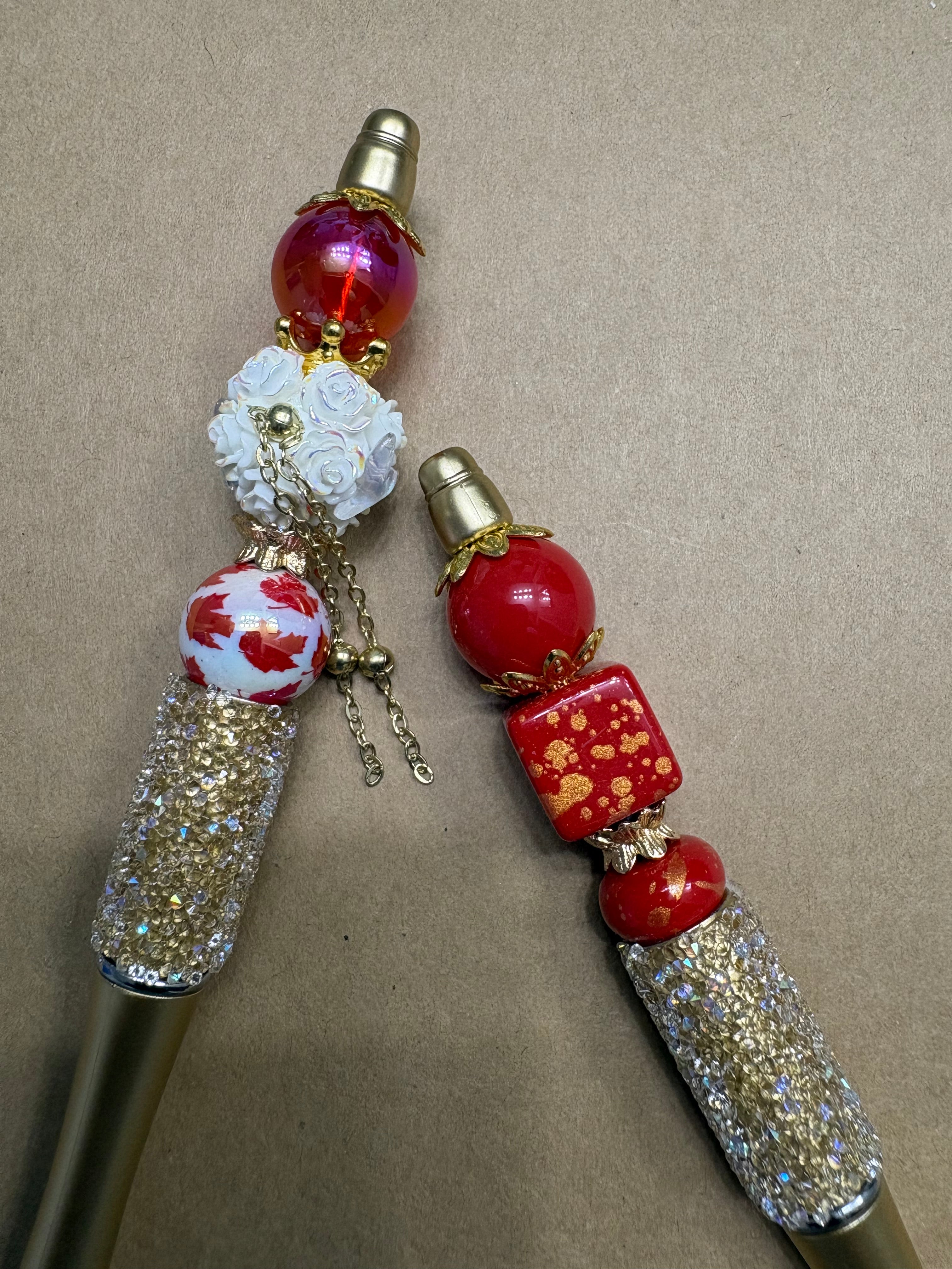 Gold and Red Flame Pens