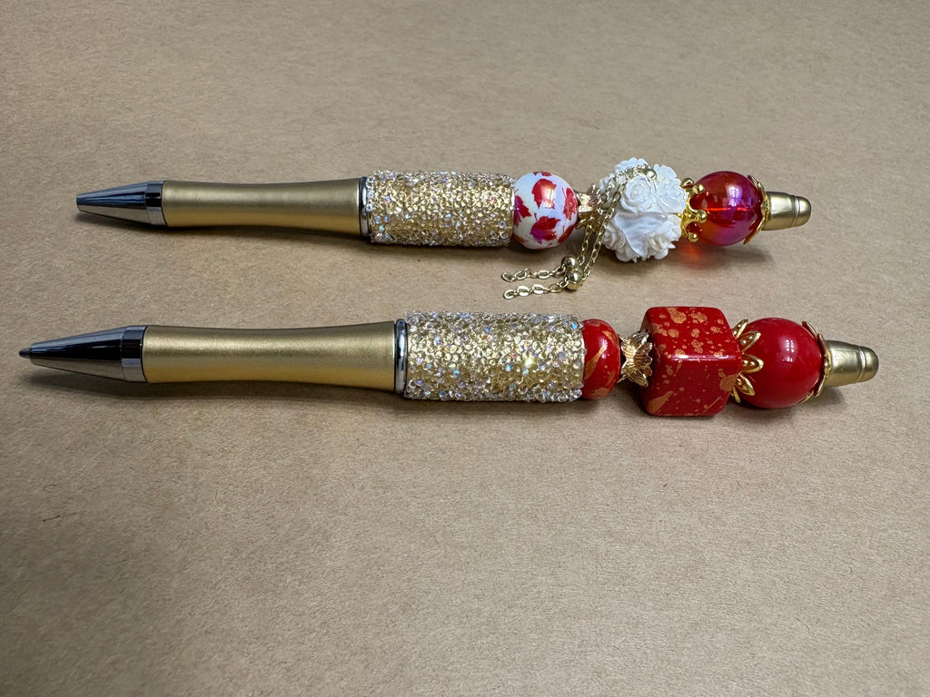 Gold and Red Flame Pens
